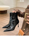 Chic women's ankle boots with zipper, high heel, pointed toe, and PU leather for stylish autumn and winter fashion.