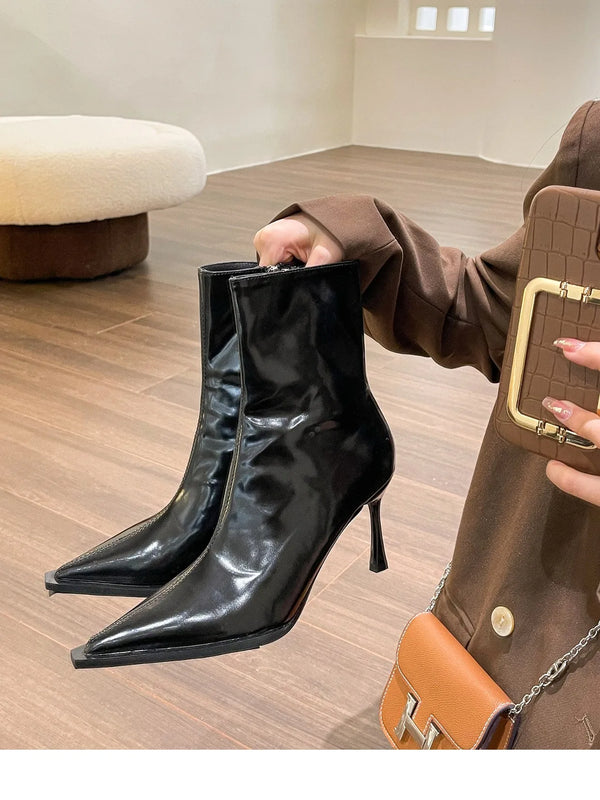 Chic women's ankle boots with zipper, high heel, pointed toe, and PU leather for stylish autumn and winter fashion.