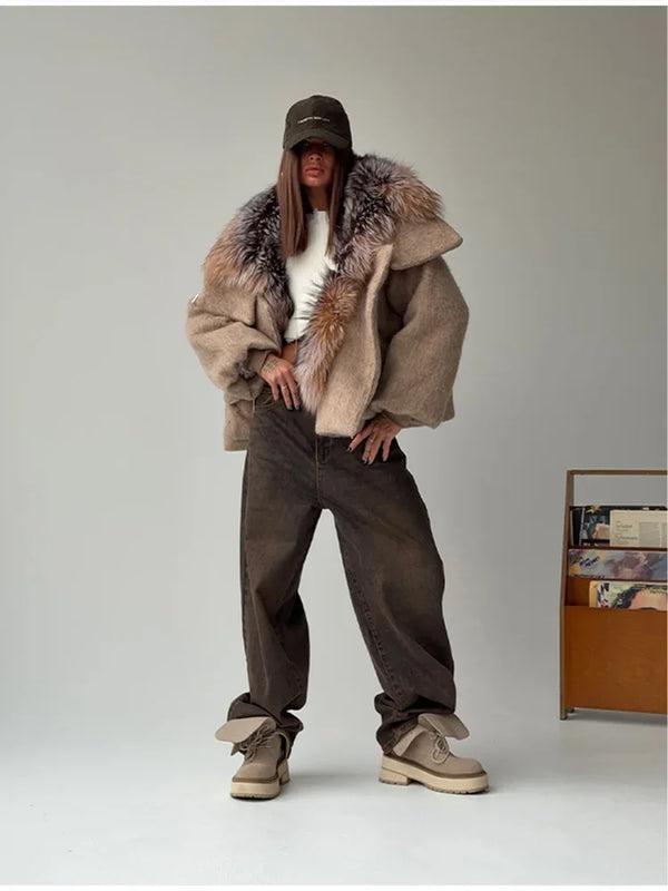 Woman wearing oversized plush jacket on chilly fall day