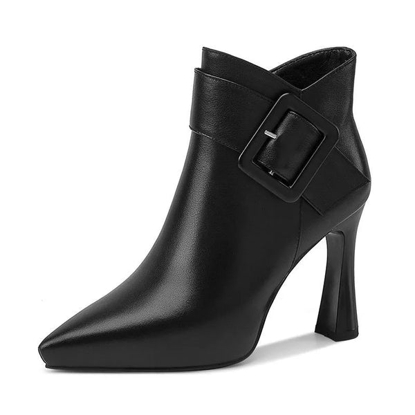 Elegant leather pumps with signature buckle detail and shearling comfort insole
