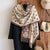 Luxe cashmere-feel scarf in soft gray, perfect for winter warmth and style.