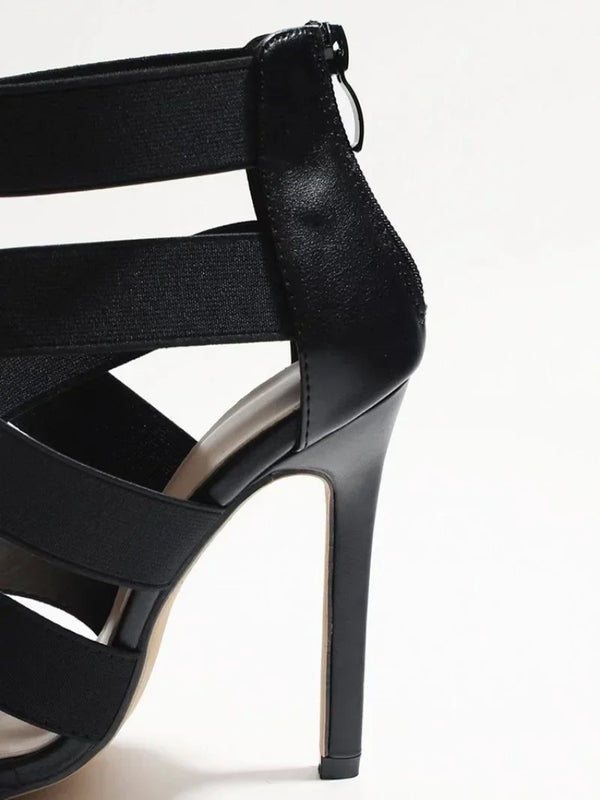 Elegant pink stiletto sandals with a sleek design and true to size fit.