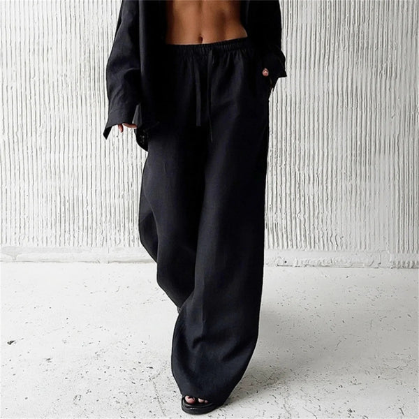 Drawstring waist detail on comfortable wide leg pants, adjustable closure for personalized fit