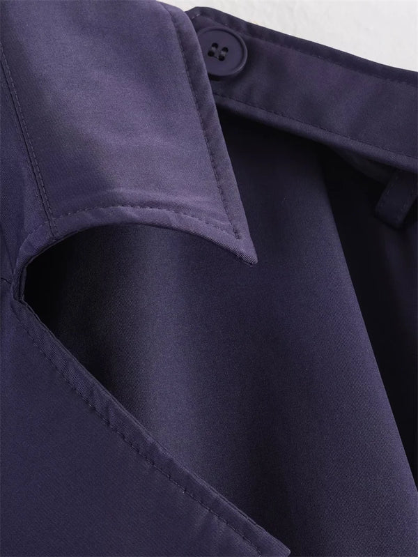 Classic short trench featuring adjustable belt and collar detail