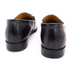 Top view of polished black genuine leather dress loafers