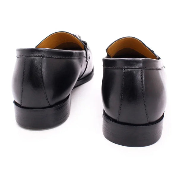 Top view of polished black genuine leather dress loafers