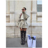 Elegant khaki trench featuring modern stand collar and timeless design