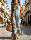 Vintage-inspired sleeveless dress with distinctive collar and flowing maxi length silhouette