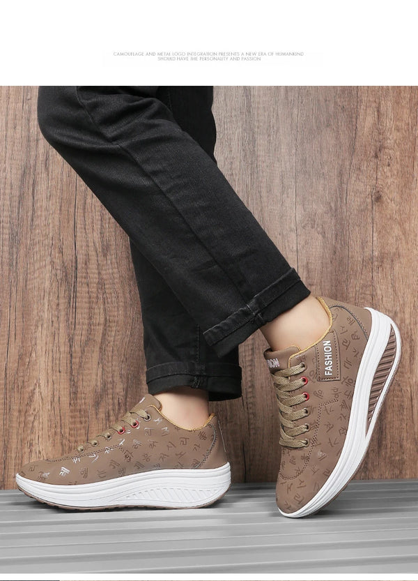 Side angle of white platform wedge sneakers showing lift
