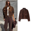 Brown zip-front jacket with oversized pockets and turtleneck collar on white background
