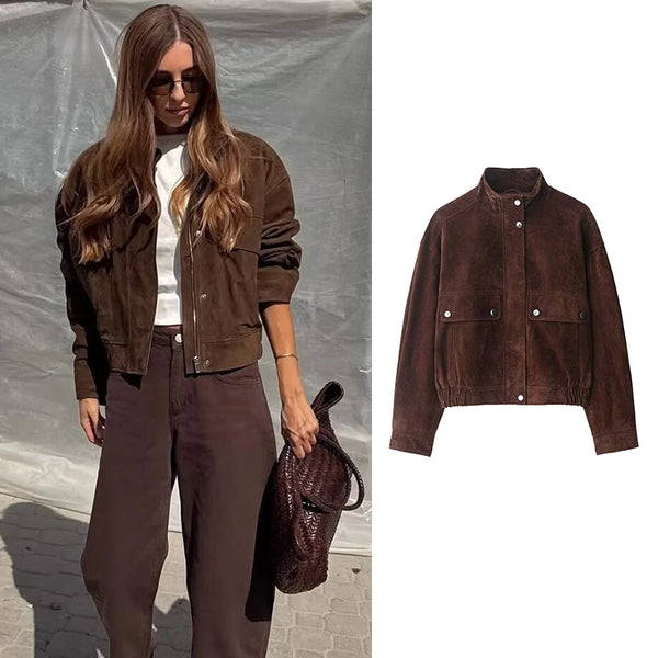 Brown zip-front jacket with oversized pockets and turtleneck collar on white background