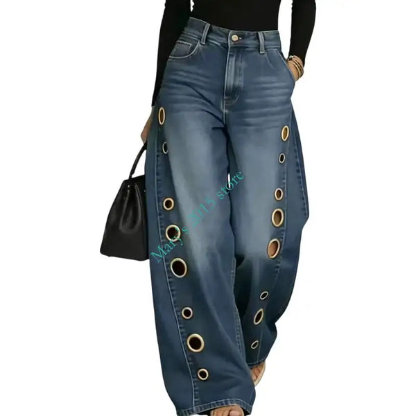 Retro inspired wide leg jeans in washed black denim with modern metal hardware