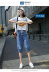 Relaxed harem jeans featuring high waistband and functional pocket design