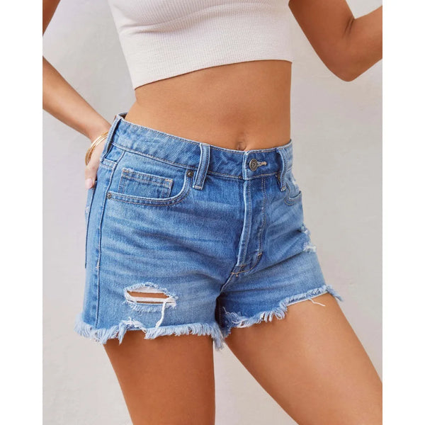 Straight leg denim shorts featuring rebellious fringe trim and secure button closure