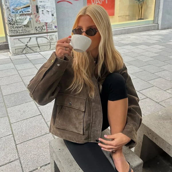 Oversized black bomber jacket in premium faux leather with street-style aesthetic