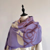 Soft cashmere-blend scarf perfect for all seasons.