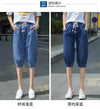High-waist harem style jeans in calf-length cut with stretchy cotton blend