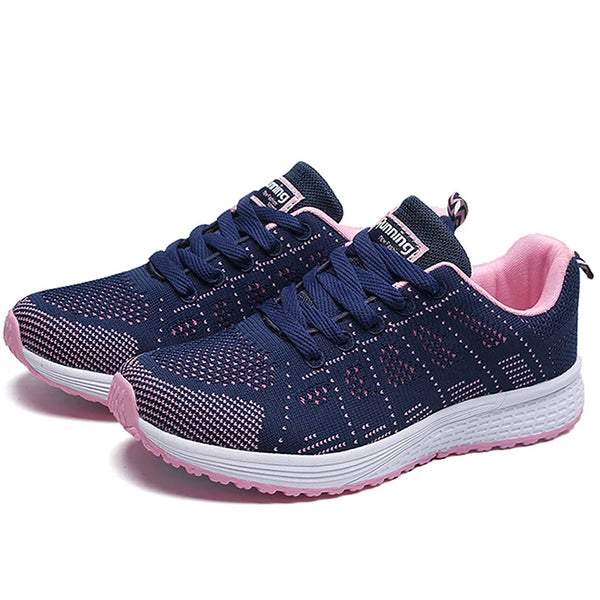 White sports sneakers with cushioned insole and vibrant colorful accents