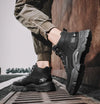 Winter Vanguard boots against a snowy landscape, showcasing weather resistance.