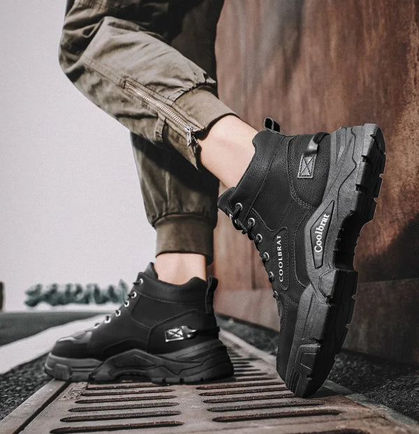 Winter Vanguard boots against a snowy landscape, showcasing weather resistance.
