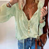 Elegant Boho Lace V-Neck Blouse for women, featuring delicate lace, relaxed fit, and lightweight fabric for casual sophistica