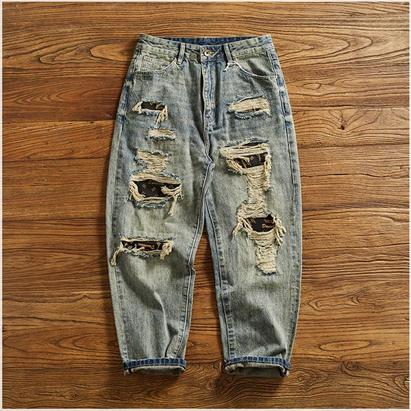 Rebel Spirit Distressed Jeans styled with hiking boots for an adventurous outfit.