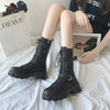 Chic mid-calf motorcycle boots for women with lace-up closure, non-slip outsole, and stylish PU leather for winter wear.