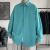 Oversized long sleeve casual shirt for men and women with Mandarin collar, perfect for spring and autumn fashion.