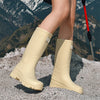 Chic waterproof women's ankle rain boots with non-slip outsole, perfect for rainy days and outdoor events.