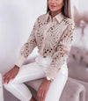 Chic women's hollowed-out long sleeve blouse in lightweight polyester, perfect for office wear or casual outings.