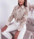 Chic women's hollowed-out long sleeve blouse in lightweight polyester, perfect for office wear or casual outings.