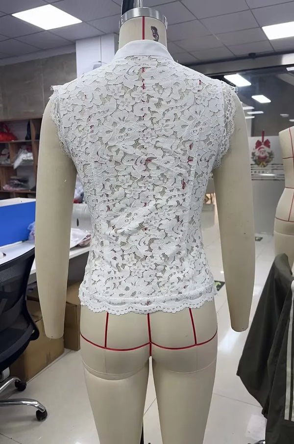 Feminine lace crop top with traditional frog button front and comfortable stretch fabric