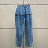 Wide leg cotton jeans with Y2K inspired distressed wash and relaxed fit silhouette