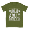Men's humorous "Mistaken For An Adult" cotton tee, relaxed fit, short sleeve, breathable fabric, perfect for casual wear.