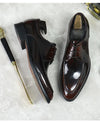 Close-up of the waterproof feature on stylish leather Oxfords.