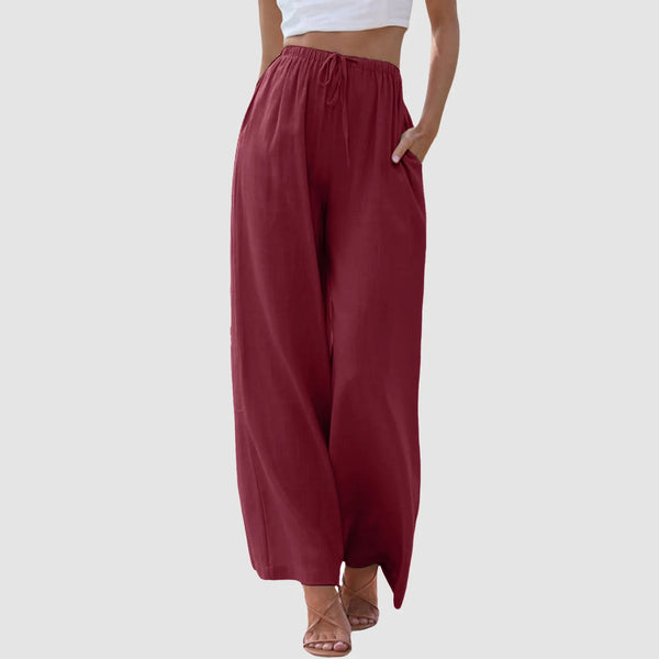 Wide-leg cotton-linen pants with pleated front and functional pockets for casual elegance