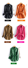 Chic women's sheepskin leather jacket with turn-down collar, lace-up belt, and adjustable waist for a stylish fit.