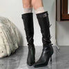 Fashionable mid-calf stiletto boots ideal for evening outings.