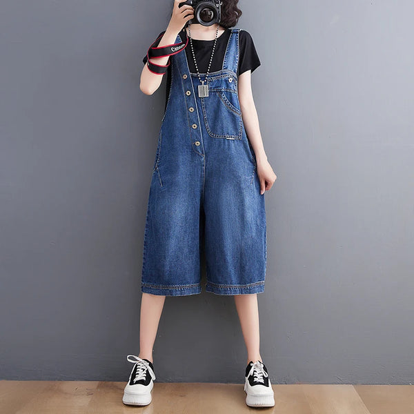 Timeless solid denim jumpsuit with adjustable suspenders and pockets for effortless street style fashion