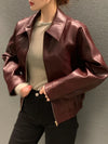 Chic cropped leather jacket for women in faux leather, featuring a turn-down collar and zipper closure, perfect for autumn an