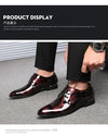 Durable rubber outsole of elegant floral men's dress shoes for longevity.