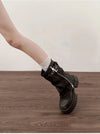 Chic women's mid-calf biker boots with buckle detail, cozy plush lining, and durable rubber sole for stylish comfort.