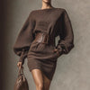 Back view of Midnight Muse Off-Shoulder Sweater Dress, displaying snug fit and stylish silhouette.