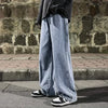 Premium quality straight wide-leg jeans in classic black denim for men
