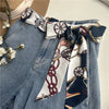 Chic fabric belt for women with geometric design, versatile for dresses, jeans, or as a scarf and headband accessory.