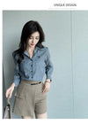 Chic striped blouse for office elegance, featuring a turn-down collar and single-breasted button front, perfect for professio
