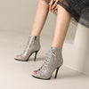 Snake-print stiletto boots styled for confident night out looks