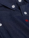 Trendy men's embroidered denim shirt with loose fit, single-breasted closure, and turn-down collar for stylish casual wear.