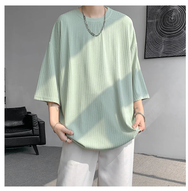 Detail of the fabric blend on striped summer tee, highlighting its softness.