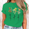 Floral print women's tee featuring 'Faith Hope Love' message, perfect for casual wear and versatile styling options.